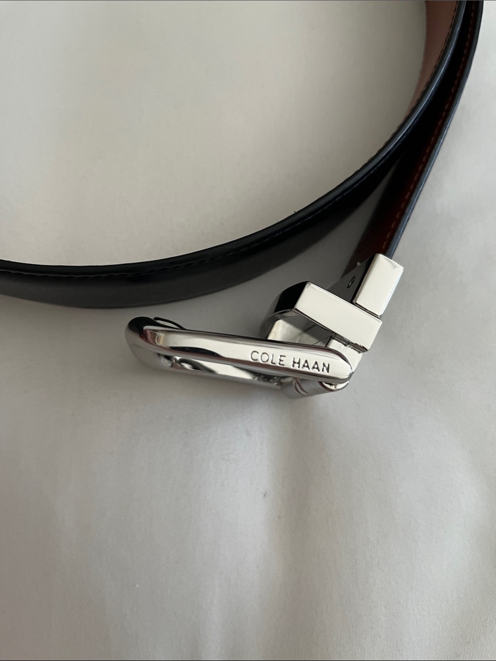Cole Haan NWOT reversible leather belt black brown silver engraved buckle 38
